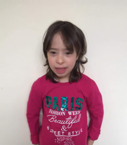 Picture of a 9-year-old girl with Down syndrome